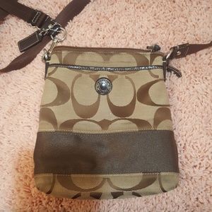 COACH Signature cross body swingpack